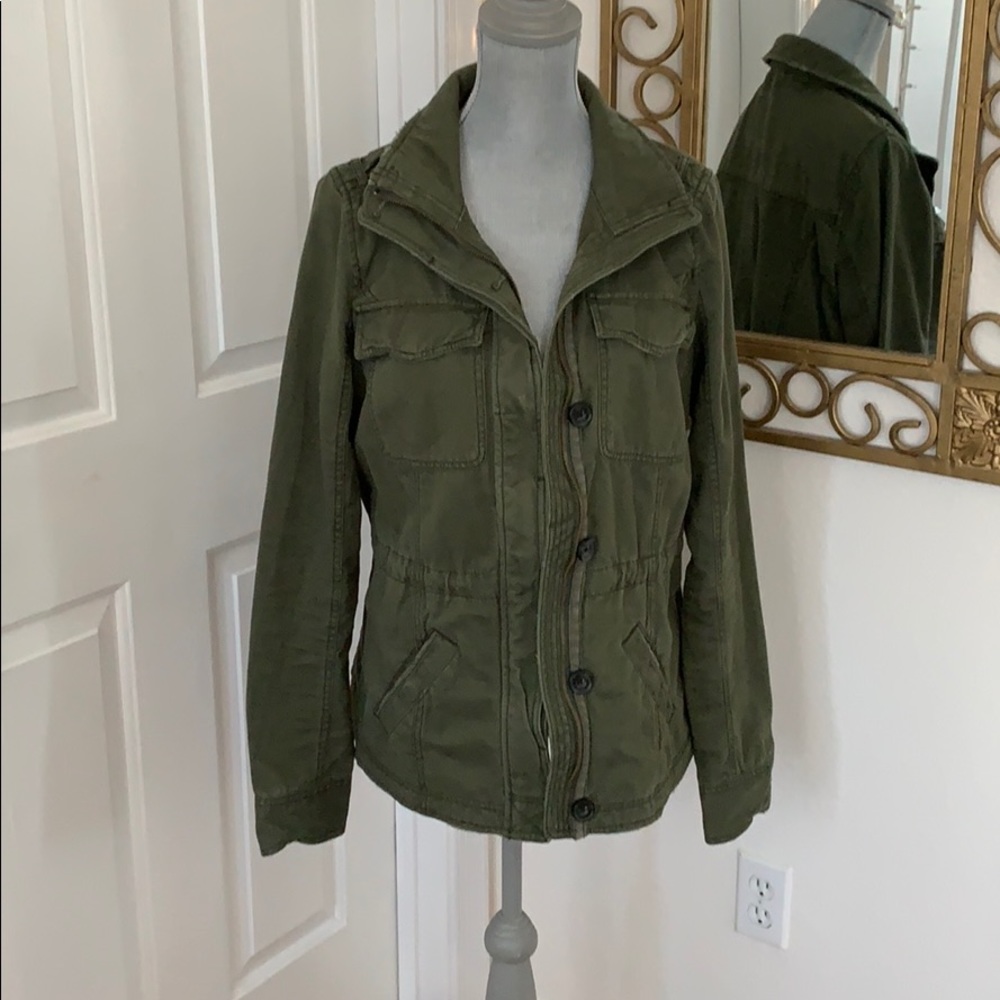 Green army jacket with distressed style